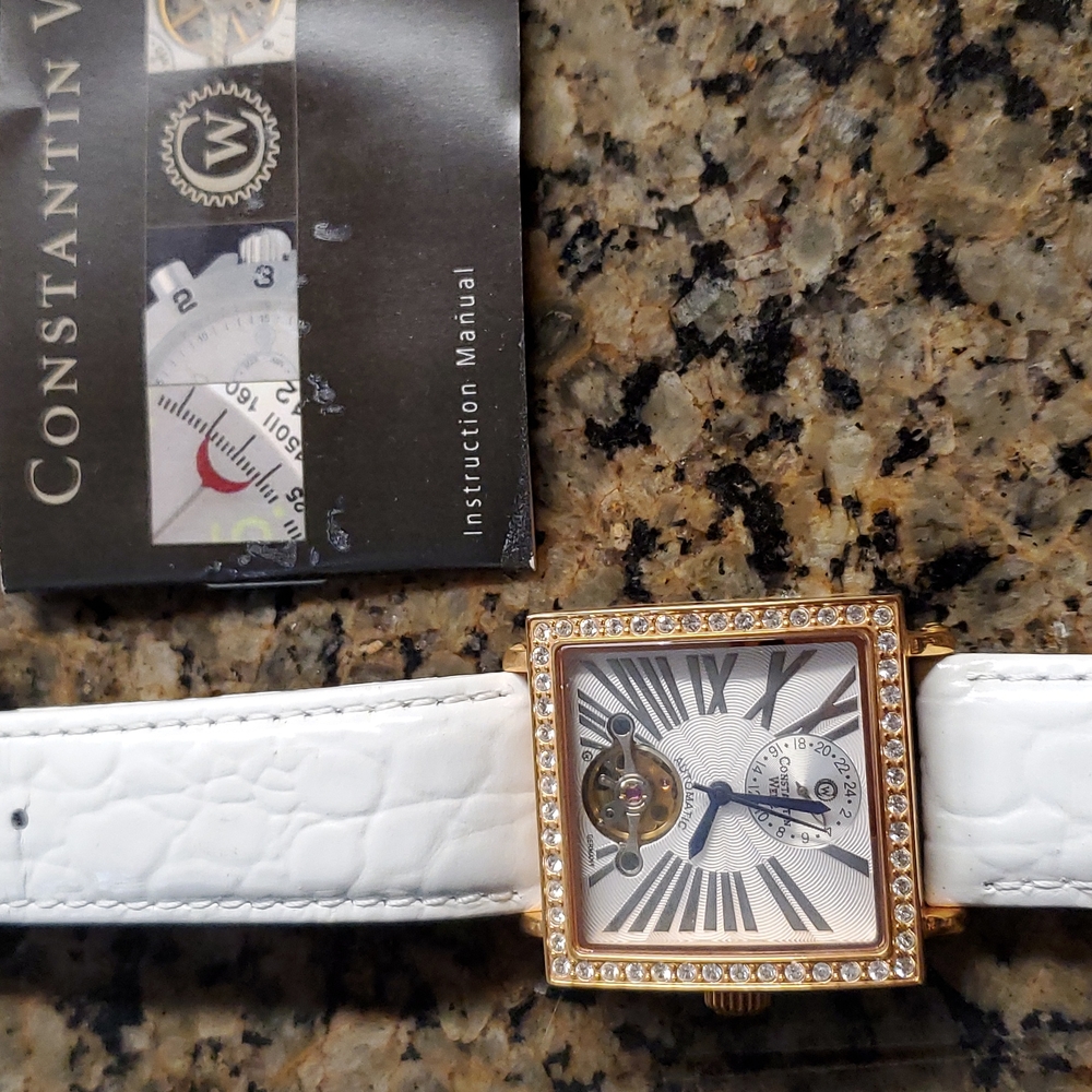 Constantin Weisz rose gold automatic watch. White leather.